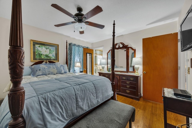 bedroom featuring ceiling fan and light hardwood / wood-style floors