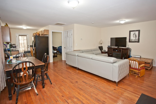 living room featuring light wood-type flooring