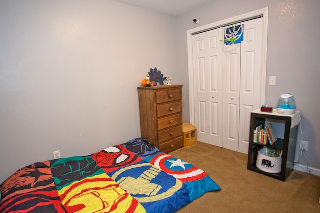 carpeted bedroom featuring a closet