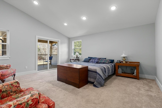 bedroom with access to exterior, light colored carpet, and vaulted ceiling