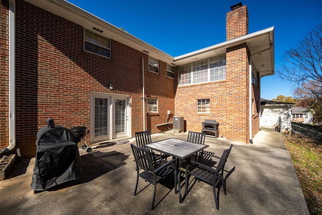 view of patio / terrace featuring grilling area and central air condition unit