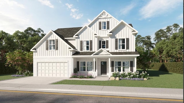 view of front facade with a garage and a front lawn