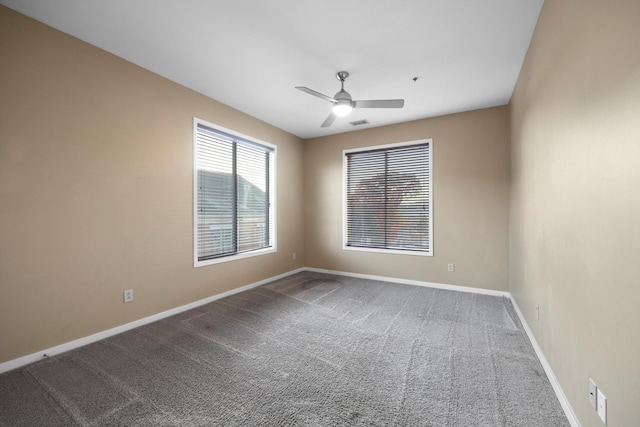 unfurnished room with carpet floors and ceiling fan