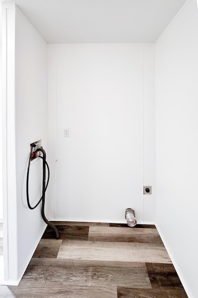 washroom with washer hookup, hardwood / wood-style flooring, and electric dryer hookup