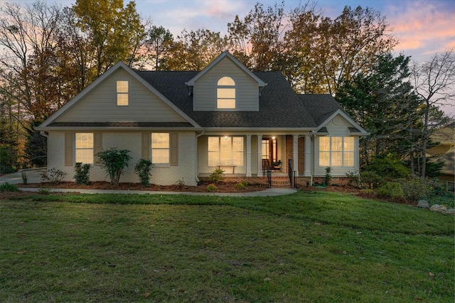 view of front of home featuring a yard