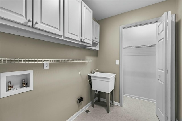 laundry area with cabinets and washer hookup