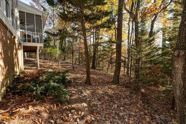 view of yard with a sunroom