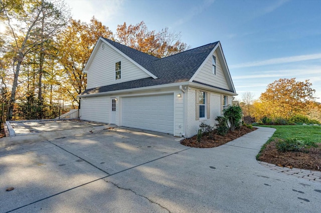 view of property exterior featuring a garage