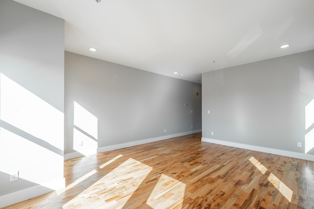 unfurnished room featuring light wood-type flooring