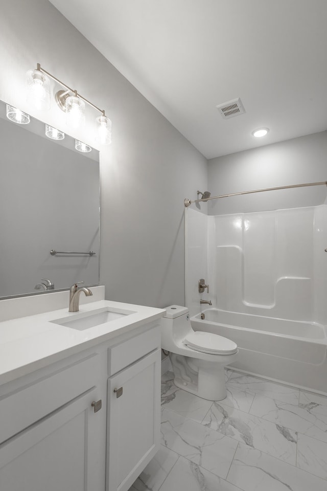 full bathroom featuring vanity, toilet, and washtub / shower combination