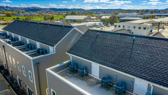 birds eye view of property featuring a mountain view