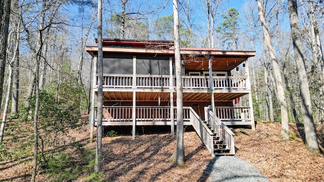 view of front of house with a wooden deck