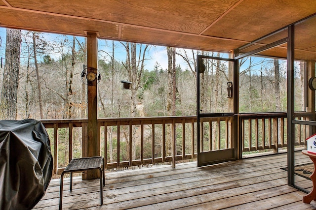 unfurnished sunroom featuring a healthy amount of sunlight