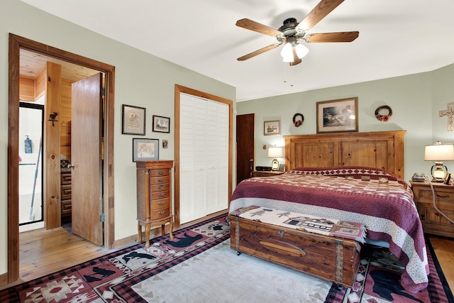 bedroom with hardwood / wood-style floors and ceiling fan