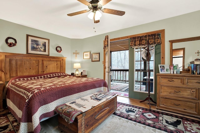 bedroom featuring light wood-type flooring, access to outside, and ceiling fan