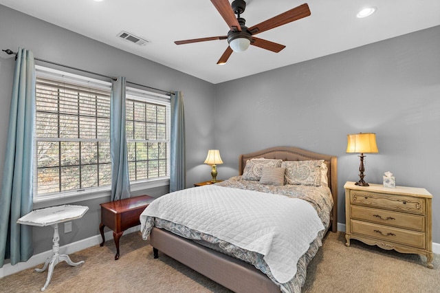 carpeted bedroom featuring ceiling fan