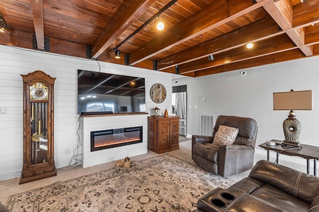 living room with beam ceiling and wooden ceiling