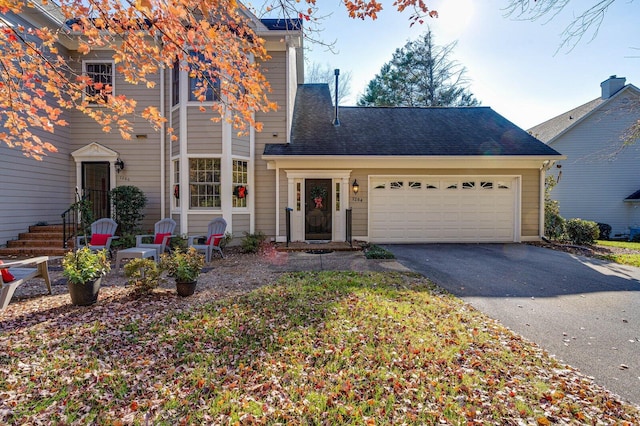 front of property featuring a garage