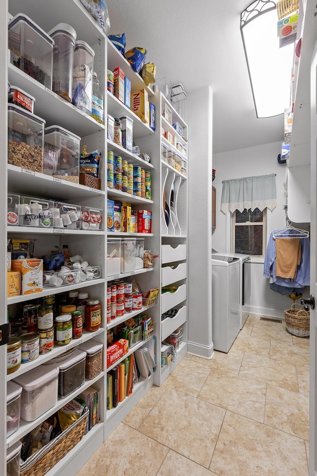 pantry with washer / clothes dryer