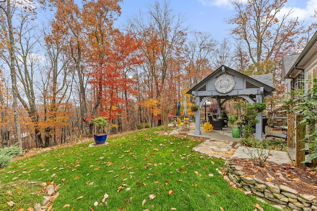 view of yard featuring a gazebo and a patio