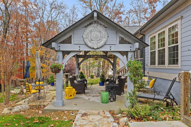 view of patio / terrace with a gazebo and an outdoor hangout area