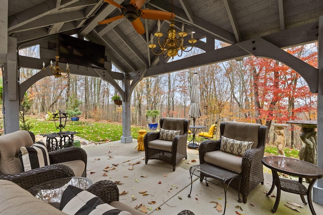 view of patio with a gazebo, ceiling fan, and outdoor lounge area