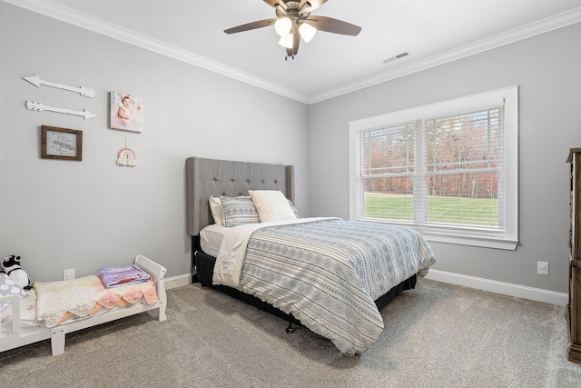 bedroom featuring ceiling fan, carpet floors, and ornamental molding