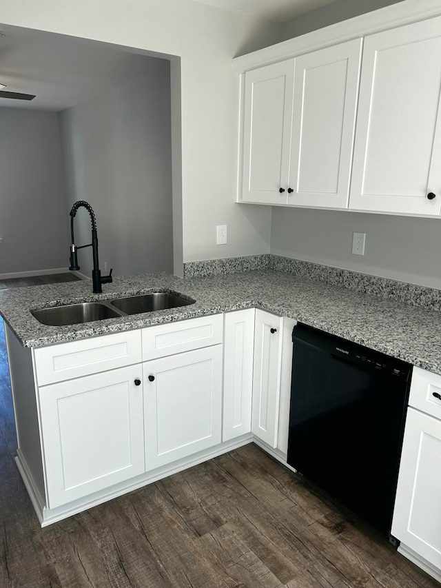 kitchen with dishwasher, dark hardwood / wood-style flooring, white cabinetry, and sink