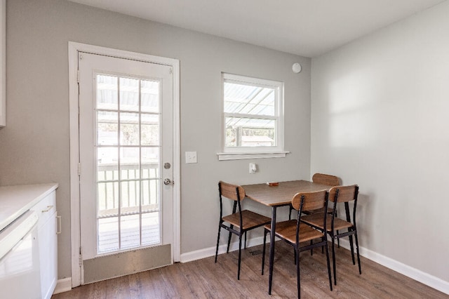 dining room with hardwood / wood-style floors