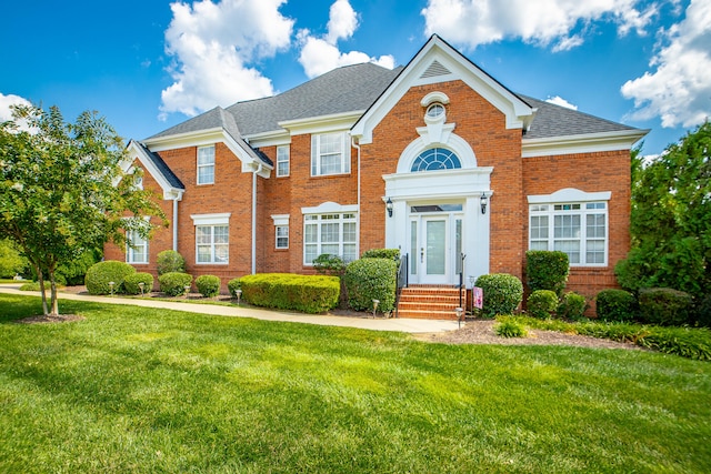 view of front of home with a front yard