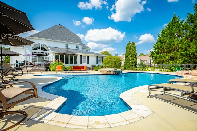 view of pool with a patio