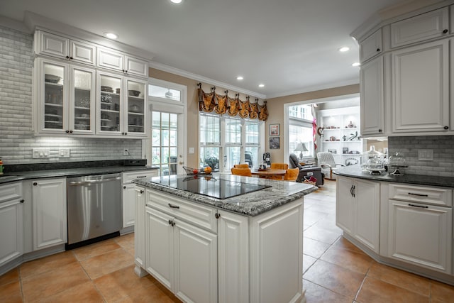 kitchen featuring crown molding, stainless steel dishwasher, black electric cooktop, tasteful backsplash, and white cabinetry