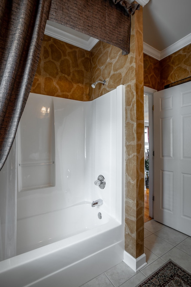 bathroom featuring tile patterned flooring,  shower combination, and ornamental molding