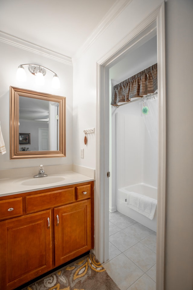 bathroom featuring crown molding, tile patterned flooring, and vanity