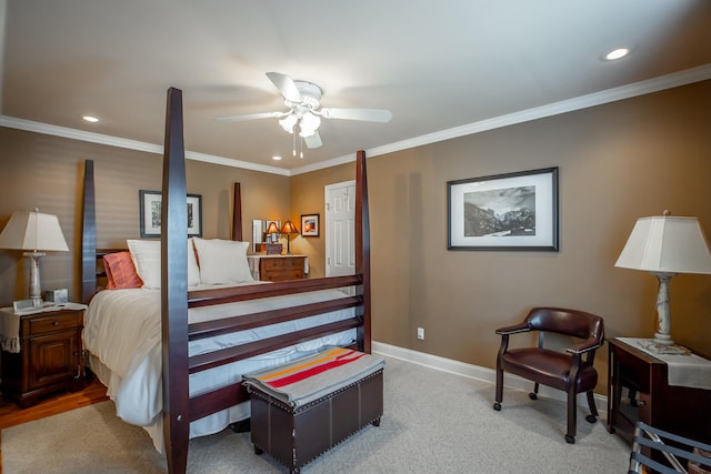 bedroom featuring ceiling fan, light carpet, and ornamental molding