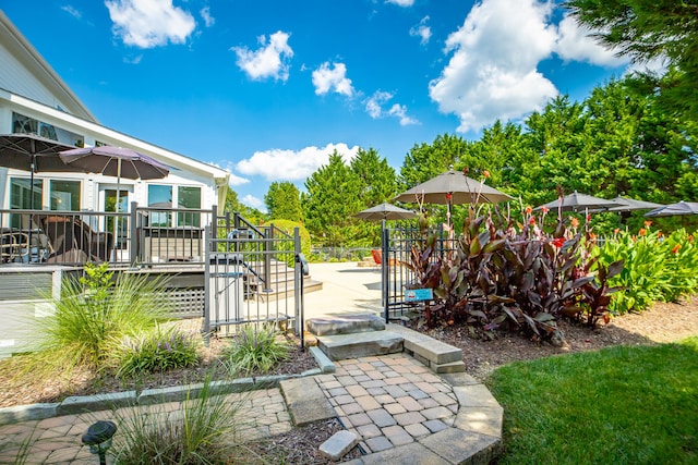 view of yard featuring a deck