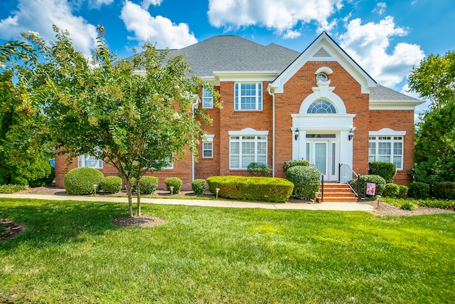 view of front facade with a front lawn