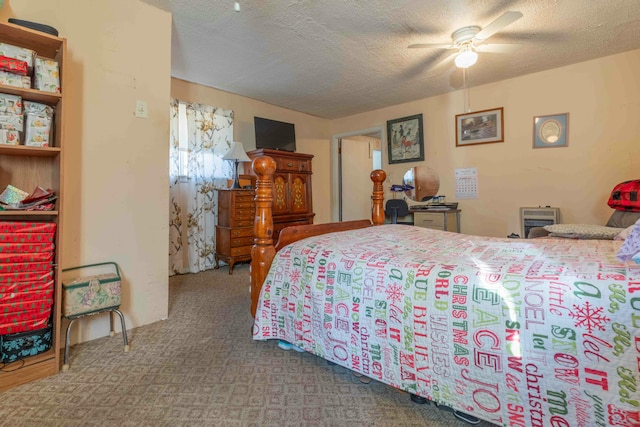 bedroom featuring carpet, a textured ceiling, and ceiling fan