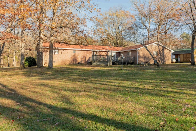 view of yard featuring a deck