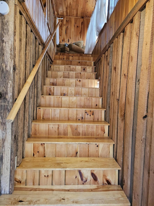 stairway with wooden walls