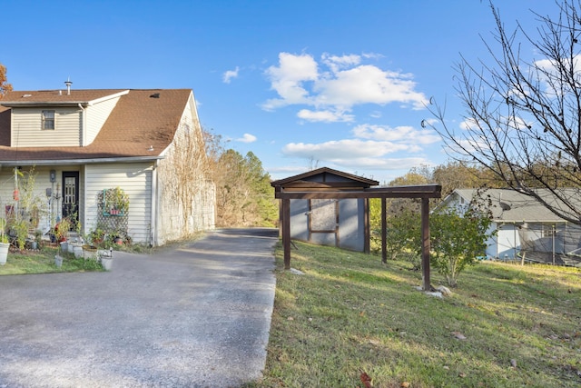 view of property exterior with a lawn