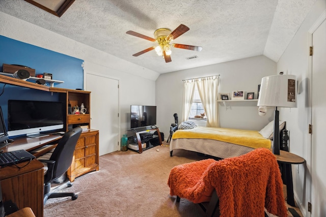 carpeted bedroom featuring a textured ceiling, ceiling fan, and lofted ceiling