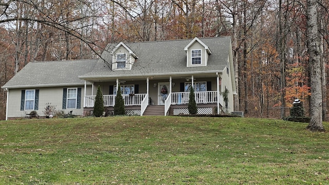 cape cod home with a front lawn and a porch