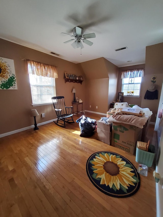 bedroom featuring ceiling fan and wood-type flooring