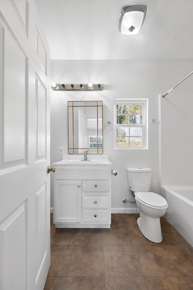 full bathroom featuring shower / bathing tub combination, vanity, and toilet