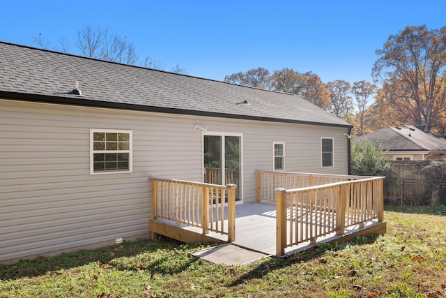 back of house with a wooden deck