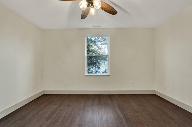 1024 Hurst St, East Ridge, TN 37412 - spare room with ceiling fan, dark wood-type flooring, and baseboards