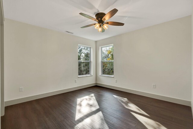 1024 Hurst St, East Ridge, TN 37412 - spare room featuring a ceiling fan, baseboards, and dark wood-style flooring