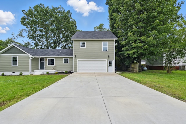 1024 Hurst St, East Ridge, TN 37412 - traditional-style home featuring a garage, driveway, and cooling unit