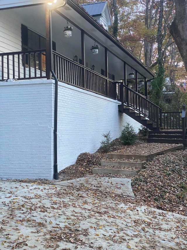 view of home's exterior featuring a sunroom